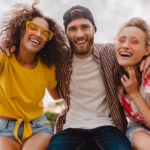 happy-young-company-smiling-friends-excited-park_285396-7633